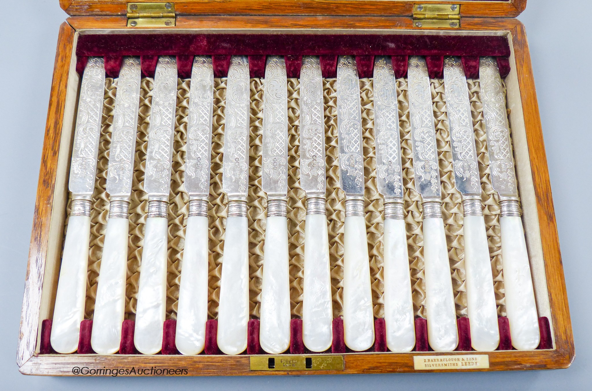A cased set of twelve pairs of late Victorian mother of pearl handled silver dessert eaters, Z. Barraclough & Sons, Sheffield, 1896.